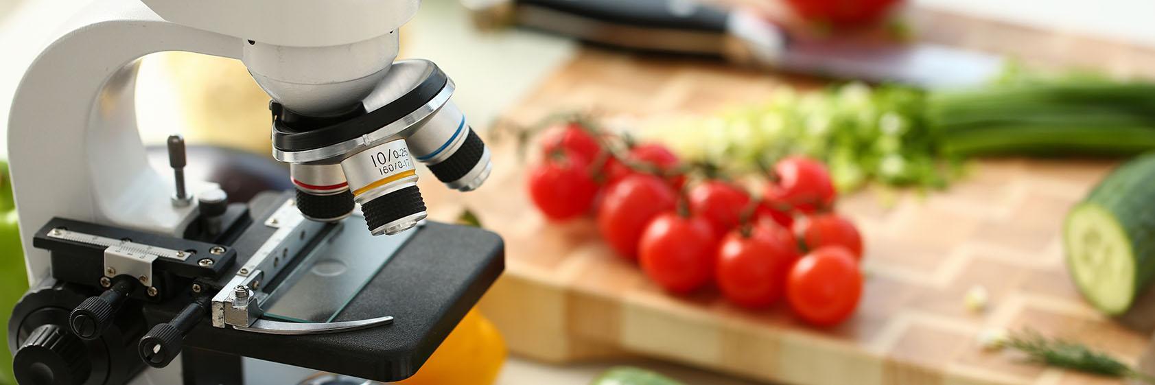 background image. Microscope and vegetables
