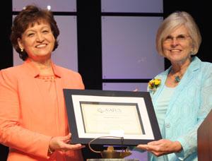 Martha Nall (left) receives AAFCS award from Bev Card. Photo courtesy of AAFCS