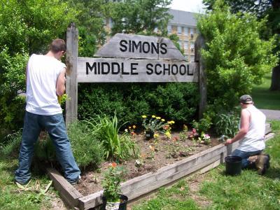 new bedding plants and shrubbery being landscaped at Simons Middle School