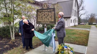 From left, Bob Weldon, Ann Vail and Jimmy Henning unveil the newest historical marker at UK. 