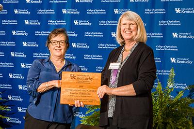 Nancy Cox presenting award to Louise Gladstone