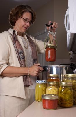 Sandra Basting holding Food Preservation Boot Camp